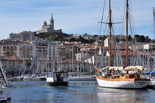 The old port of Marseille is lined with yachts and fishing boats